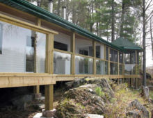 6mm clear laminated glass
installed with wood stops
no top rail Handrails