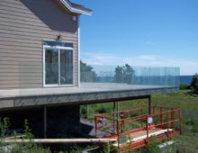 15mm clear tempered glass
installed with 4" stainless steel stand-offs
no top rail Handrails