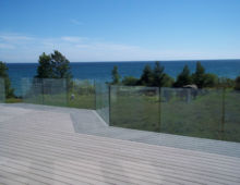 15mm clear tempered glass
installed with 4" stainless steel stand-offs
no top rail Handrails