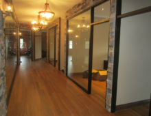 bronze anodized 500 series framing
1/2" clear tempered glass with butt joints interior office