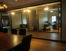 bronze anodized 500 series framing
1/2" clear tempered glass with butt joints interior office